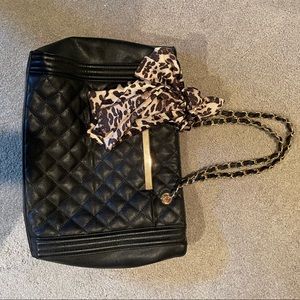 Black faux leather shoulder bag. With a silk scarf. Used once.